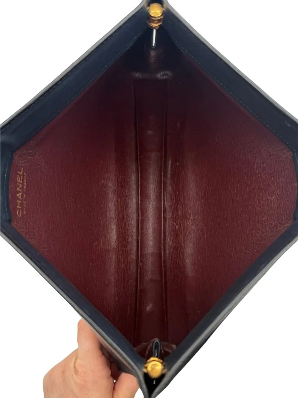 Vintage CHANEL Lambskin Leather Clutch with Mini Embossed CC Logos